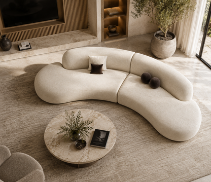 Oria Sofa by Urbana Craft presented in a high-end designer living room with a warm and luxurious atmosphere.
