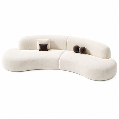 Oria Sofa by Urbana Craft studio product image featuring its curved silhouette and premium fabric finish.